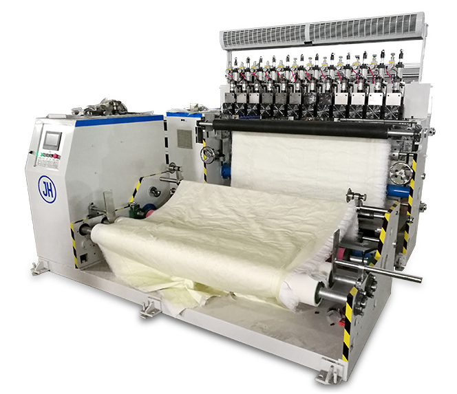 Multilayer nonwoven fabric embossing and cutting machine